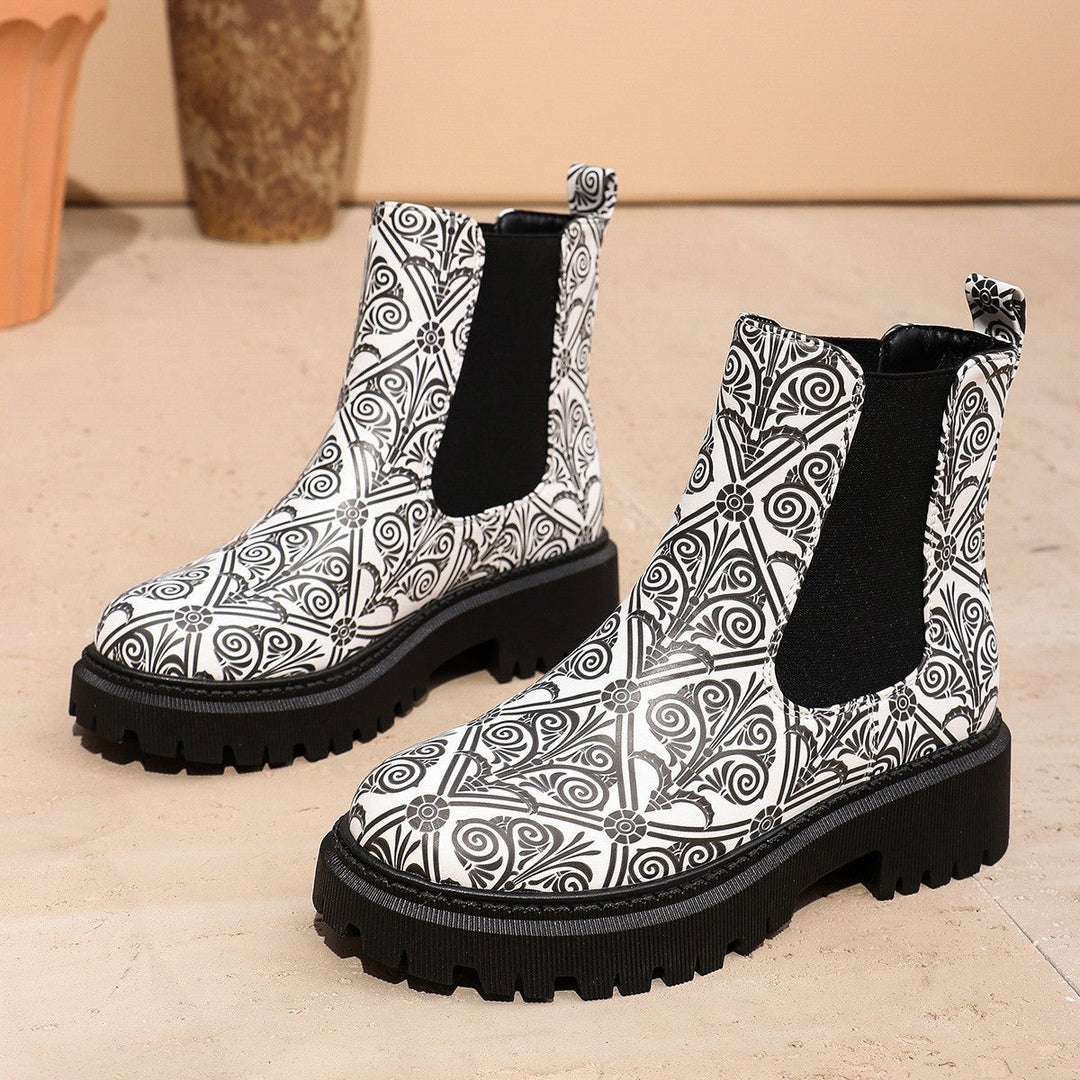 Chelsea-Boots mit schwarz-weißem Blumenornament und dicker Sohle