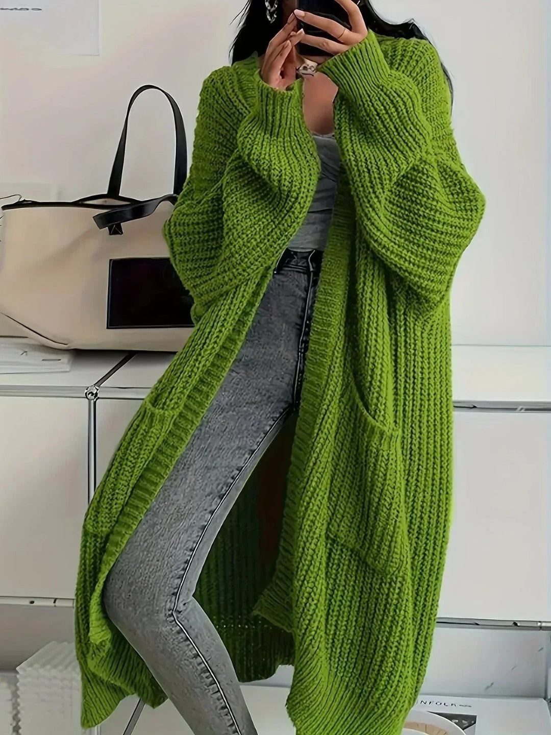 Grüne oversize Strickjacke im Rippstrick-Design mit Seitentaschen