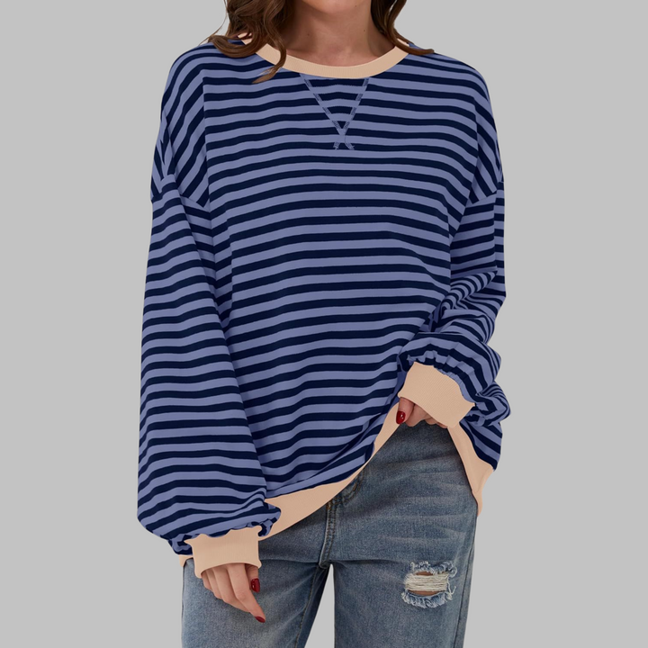 Marineblau-hellblau gestreiftes Sweatshirt mit beigen Bündchen und Retro-Streifenmuster