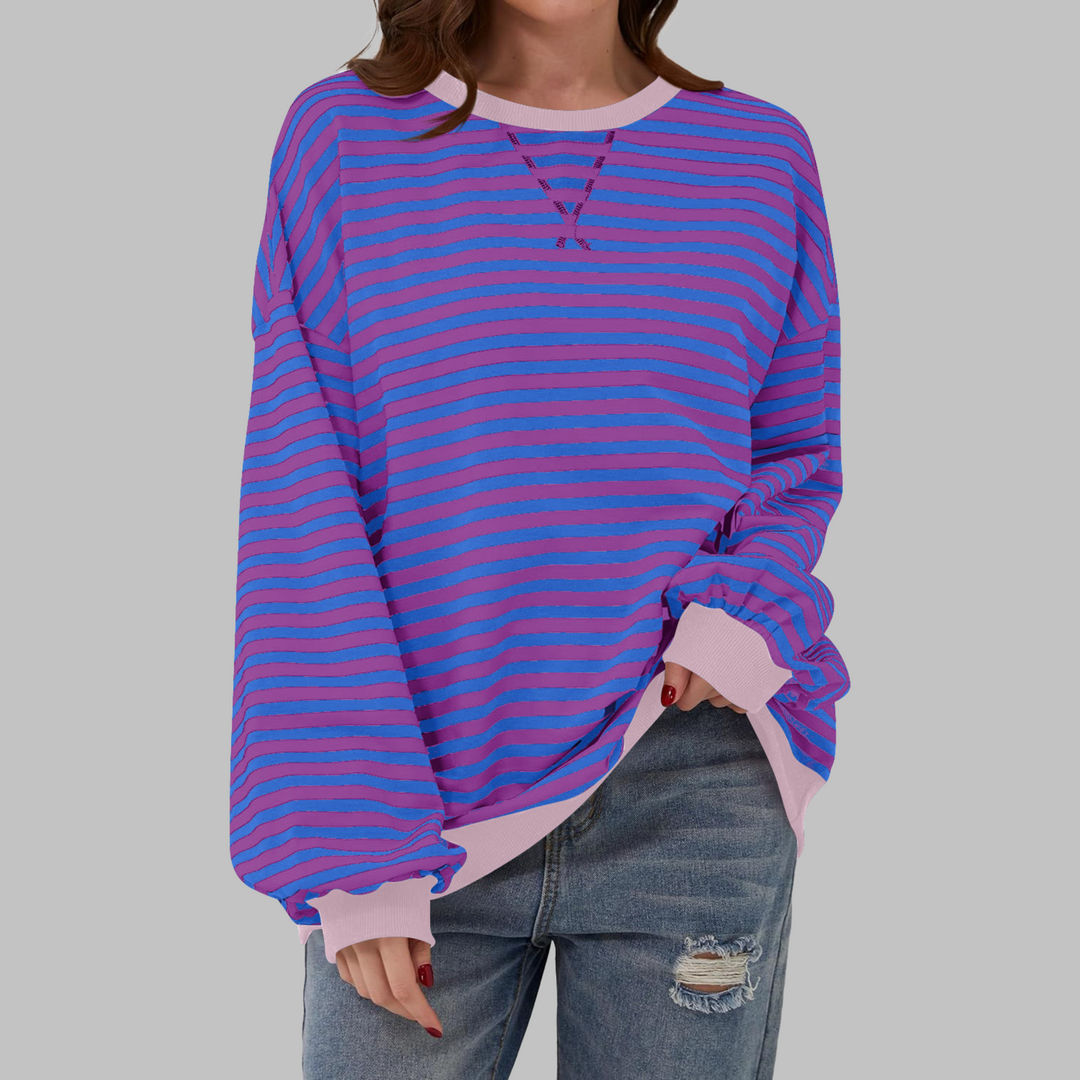 Blau-lila gestreiftes Oversize-Sweatshirt mit rosa Kontrastbündchen und weitem Schnitt