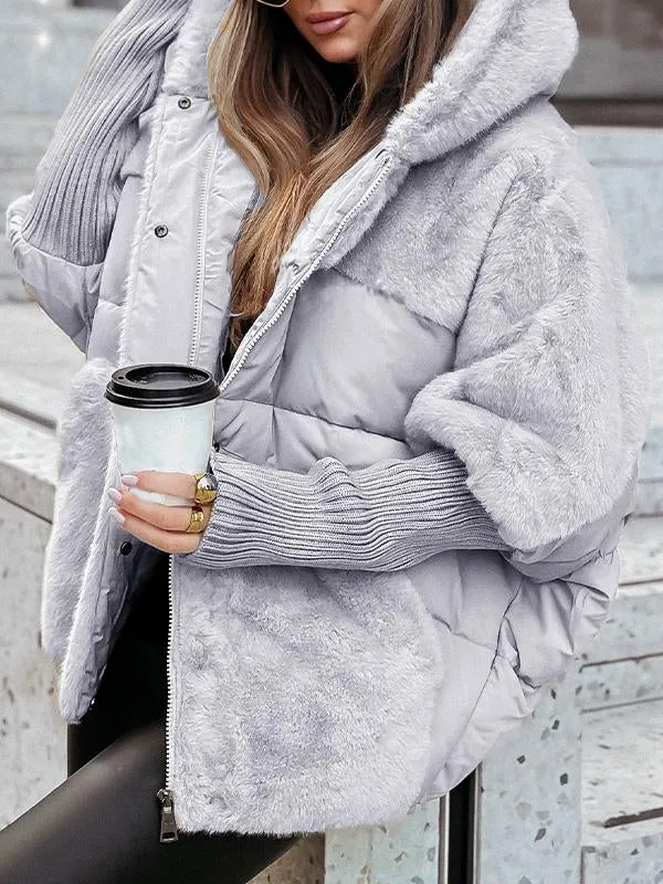 Schwarze Winterjacke mit Kunstfellkragen und Steppmuster, Seitenansicht