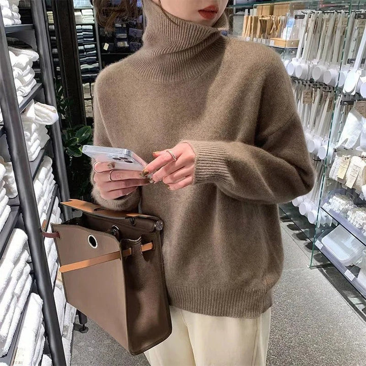 Brauner Rollkragenpullover Oversized aus Strick mit weiter Passform und Tragetasche