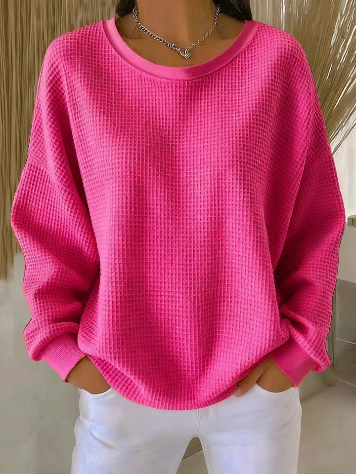 Pinker Oversize-Pullover mit auffälligem Waffelstrickmuster