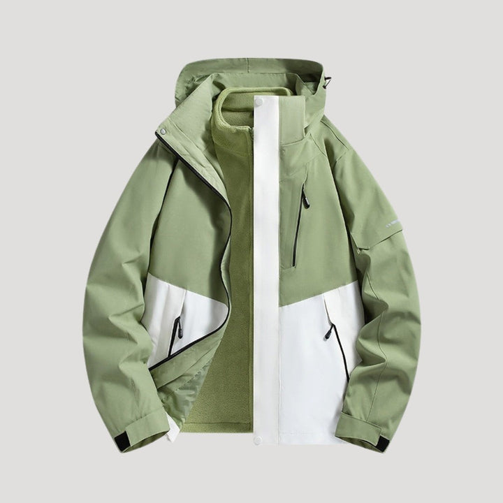 Grün-weiße Outdoorjacke mit Kapuze und wasserdichten Taschen