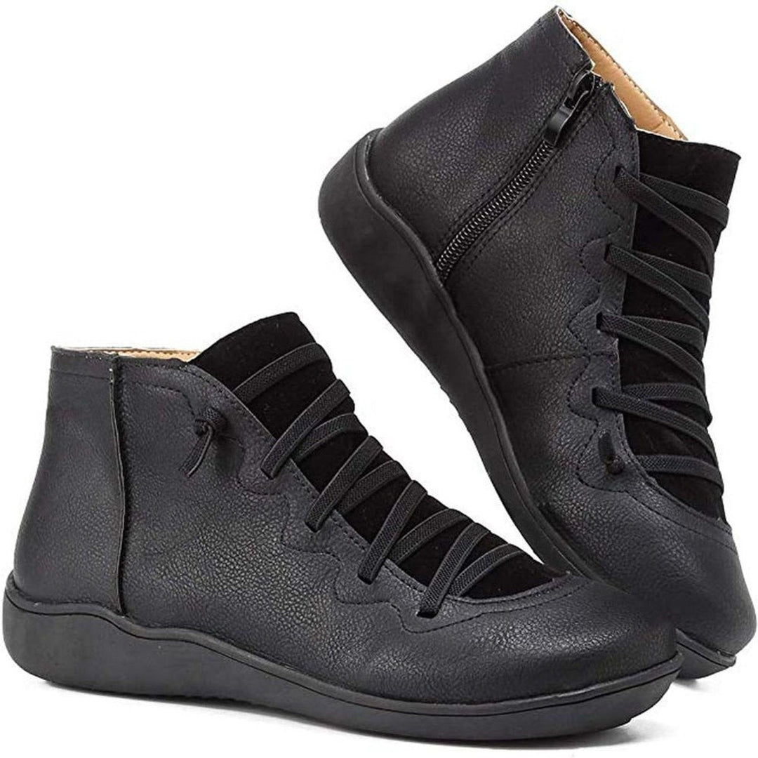 Schwarze Stiefeletten aus veganem Leder mit flacher Gummisohle