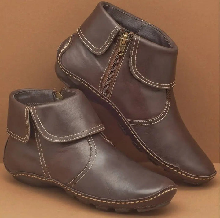 Dunkelbraune Lederstiefelette mit gesteppter Manschette und Reißverschluss