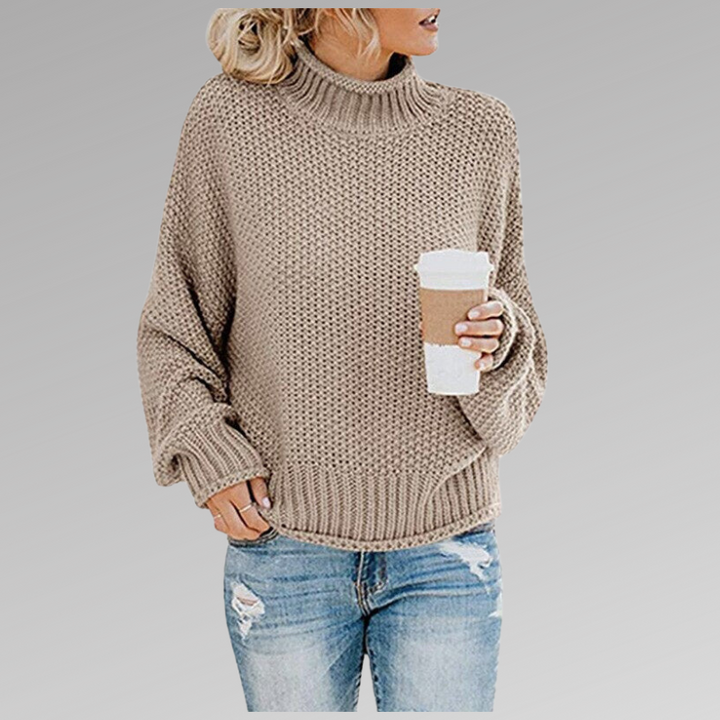 Beigefarbener Oversize Strickpullover mit Stehkragen und Rippbündchen