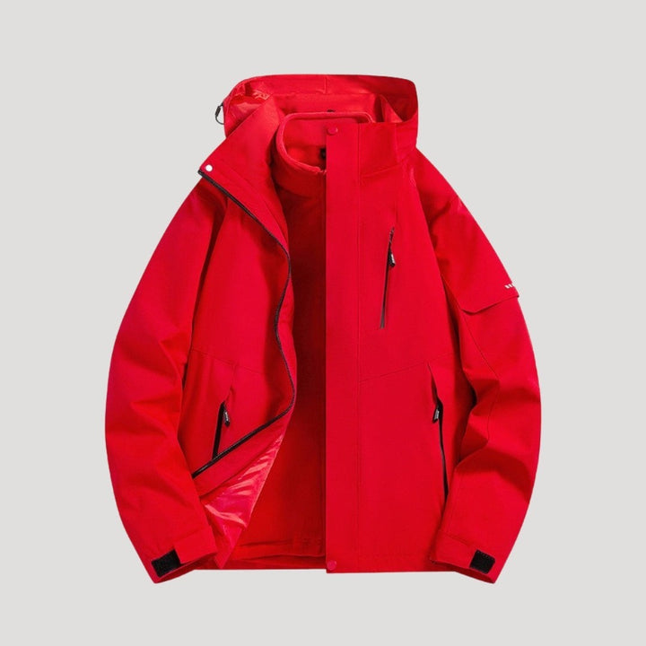 Rote wasserdichte Jacke mit Kapuze und mehreren Reißverschlusstaschen