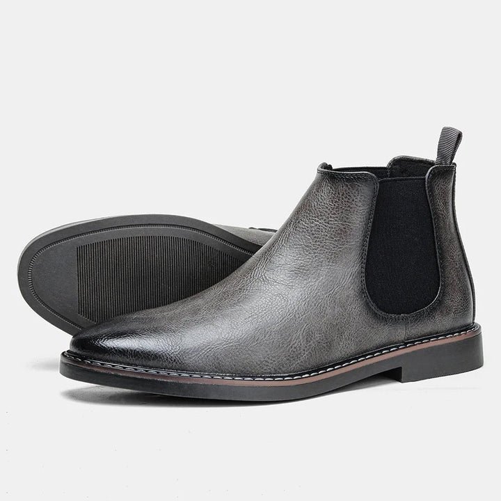 Graue Chelsea Stiefeletten aus veganem Leder mit schwarzem Seiteneinsatz