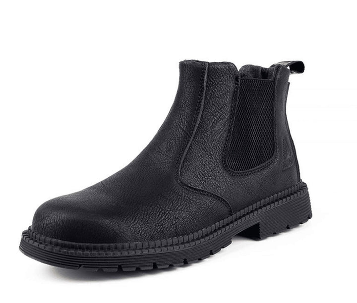 Schwarze Chelsea-Boots mit robuster Profilsohle und elastischen Einsätzen