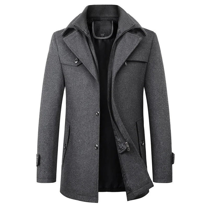 Anthrazitgrauer Herrenmantel mit Strickkragen und mehreren Taschen, mittellange Länge