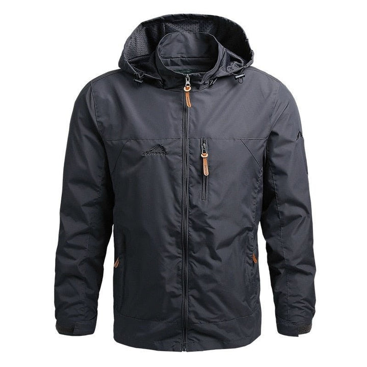 Anthrazitfarbene Funktionsjacke mit Kapuze und Reißverschlusstaschen, freigestellt