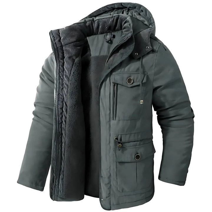 Winterjacke dunkelgrün mit Kapuze, Fleecefutter und mehreren Taschen